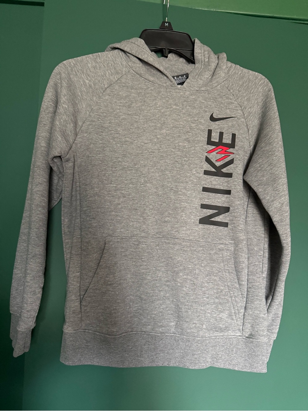 Nike Boy’s Gray Pullover Hoodie with Vertical Logo and Red Accent